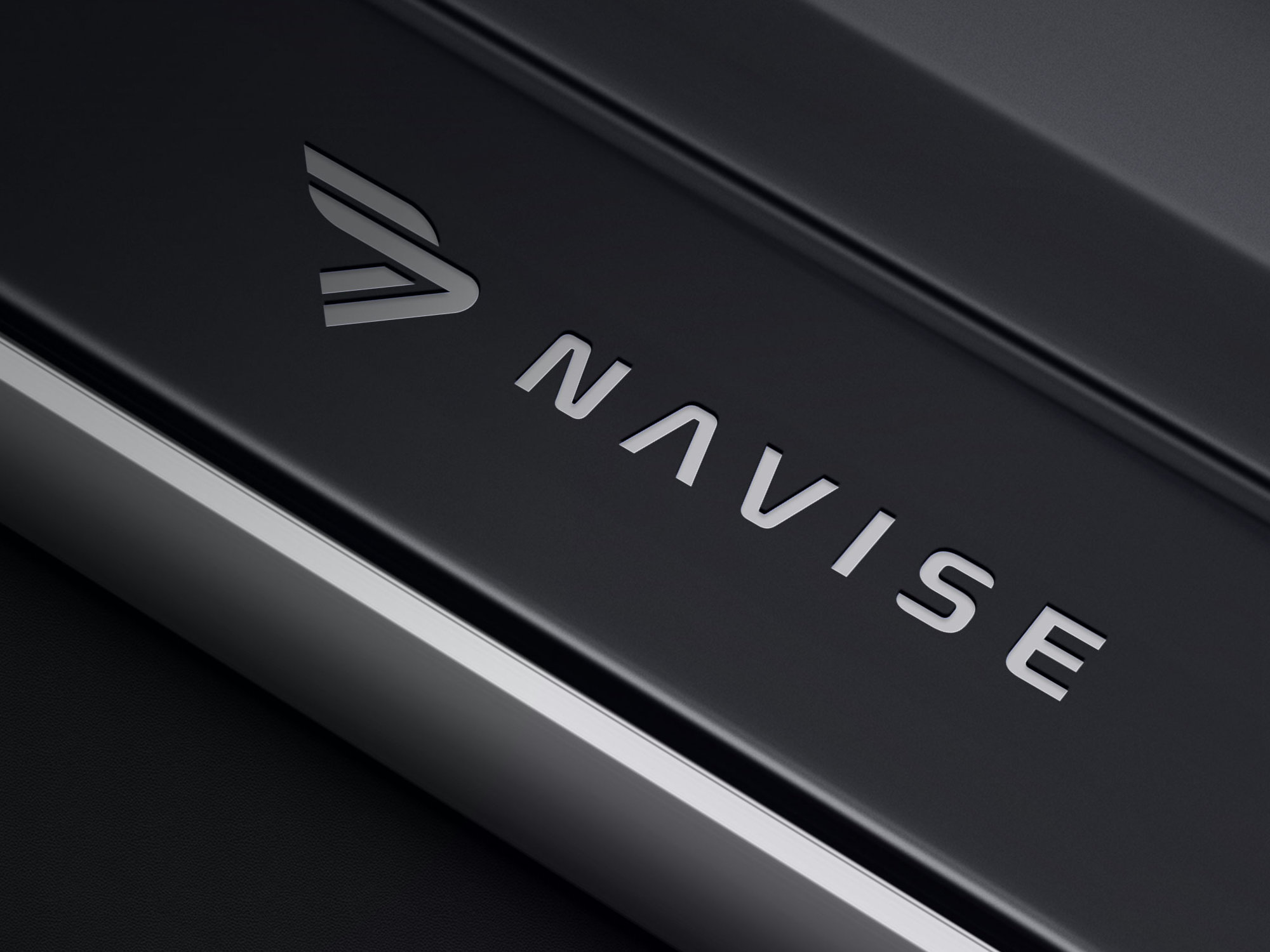 Navise Yachts luxury logo design with custom symbol and sleek metallic finish created by Artevium