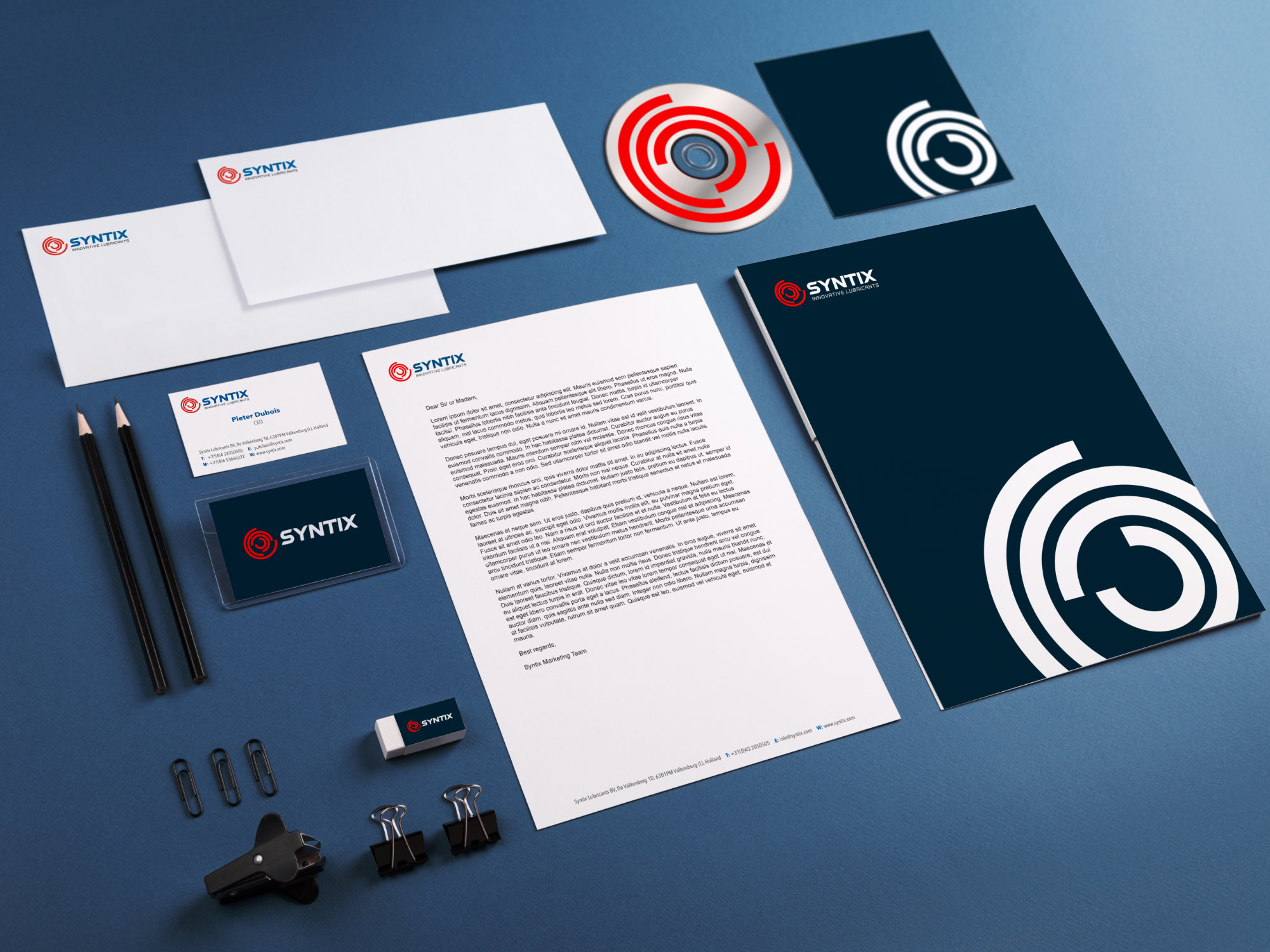 Syntix branded stationery set including business cards, letterhead, and envelopes
