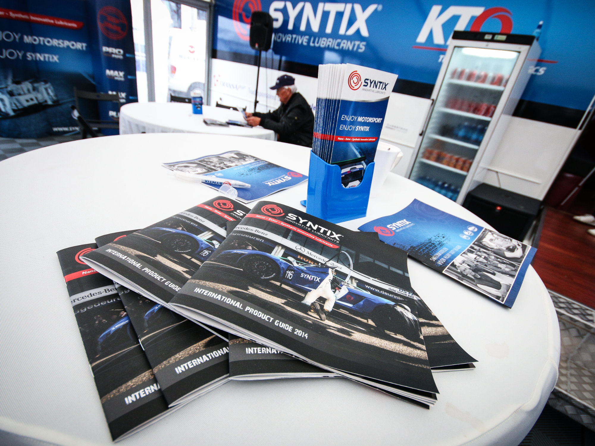 Syntix brochures and printed brand collateral featuring bold design, custom typography, and product visuals