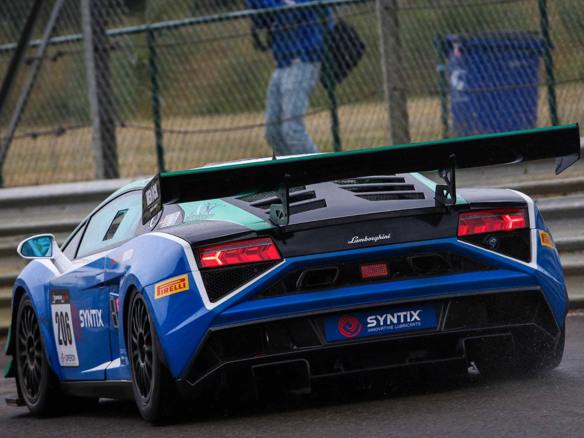 Race car with the Syntix logo prominently displayed on the body